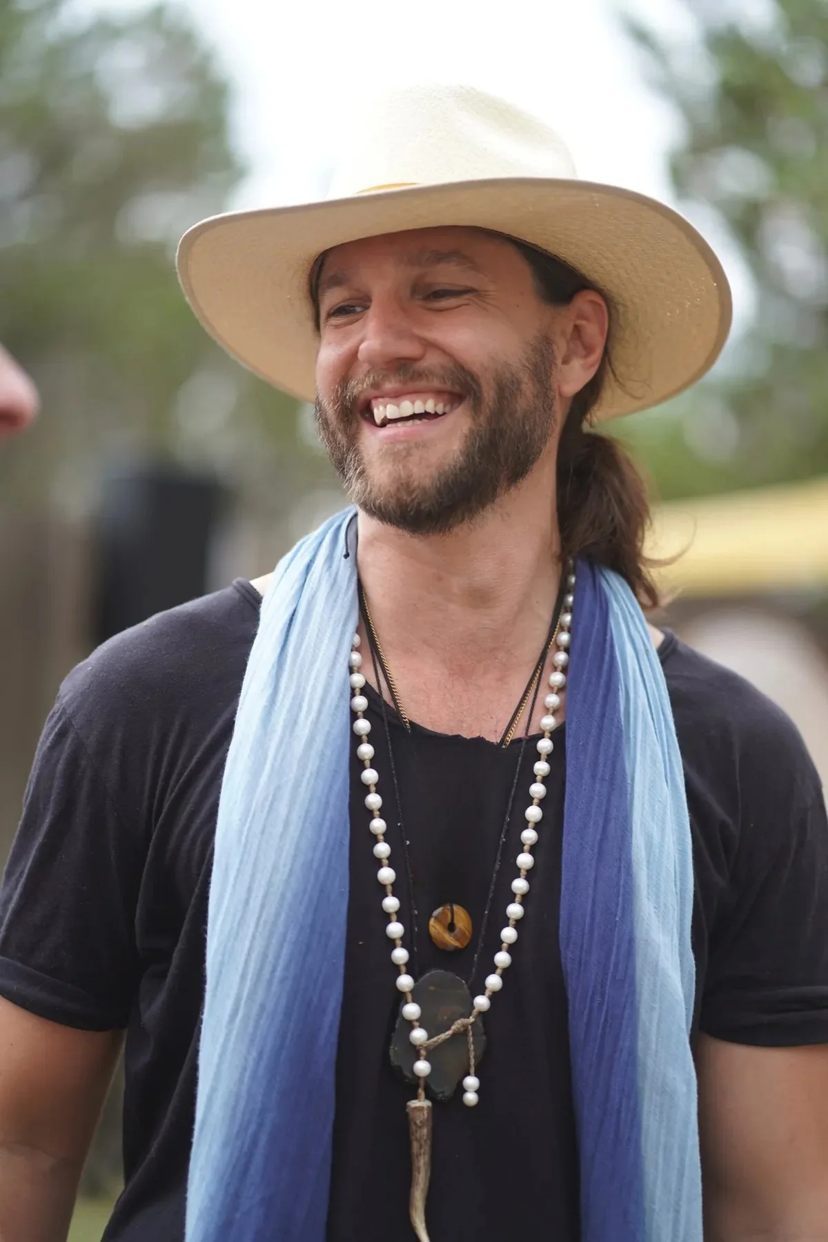 Jackson Strong, smiling in a white hat